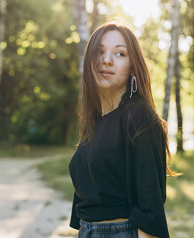 Woman experiencing mental wellbeing in nature